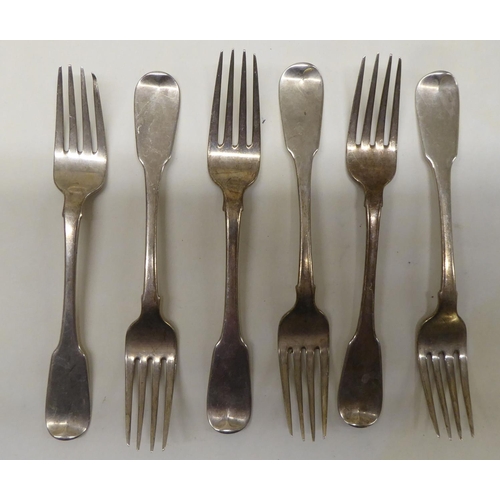 135 - Silver flatware, six fiddle pattern forks  mixed marks