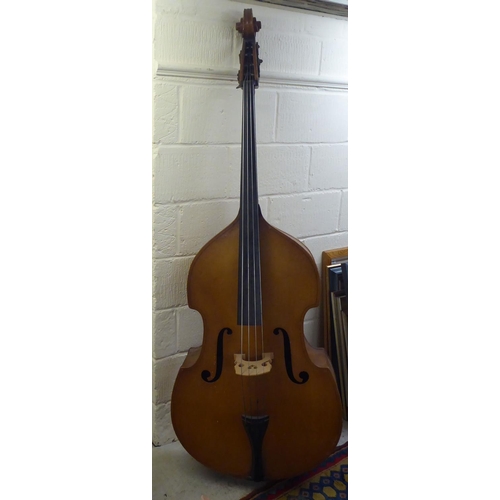 147 - A double bass with a 49