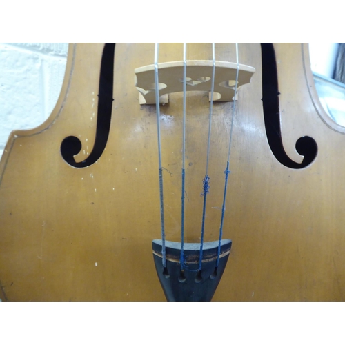 147 - A double bass with a 49