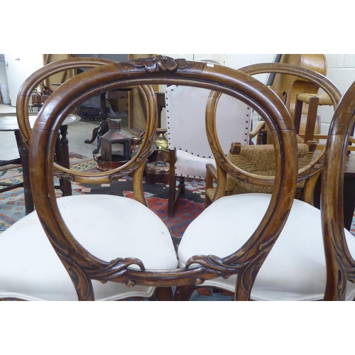 154 - Two similar pairs of late 19thC mahogany framed open back dining chairs, the later fabric covered se... 