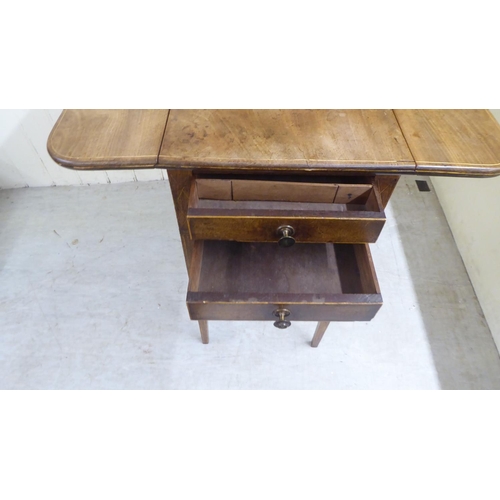 168 - Small furniture: to include a late 19thC string inlaid mahogany oval occasional table, raised on squ... 