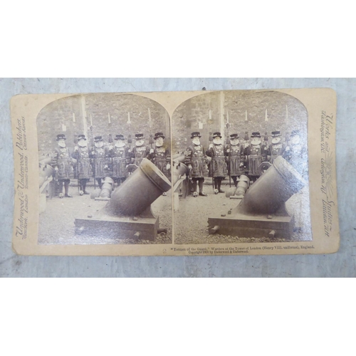 188 - An early 20thC stereoscopic viewer; and viewing cards