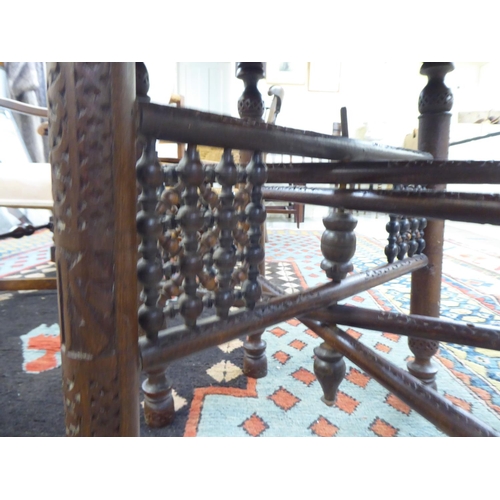 192 - An early/mid 20thC Indian brass tray, on a carved teak folding underframe  22