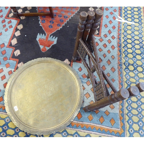 192 - An early/mid 20thC Indian brass tray, on a carved teak folding underframe  22