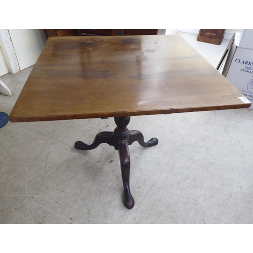 193 - A late 19thC mahogany (marriage) pedestal table, the top raised on a turned column and tripod base  ... 