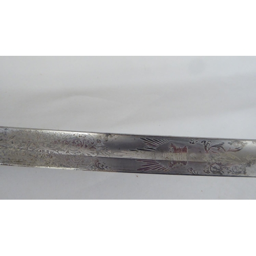 196 - A World War II period dress sword (Please Note: this lot is subject to the statement made in the Auc... 