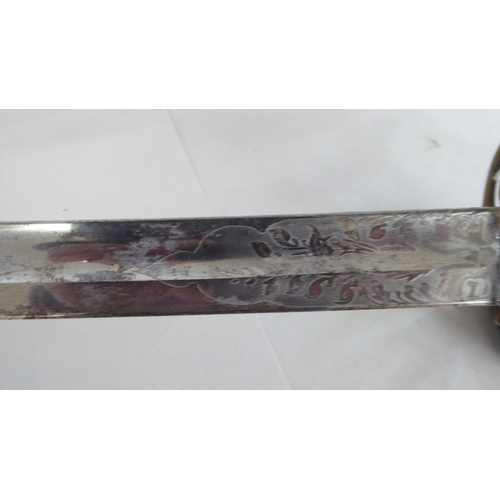 196 - A World War II period dress sword (Please Note: this lot is subject to the statement made in the Auc... 