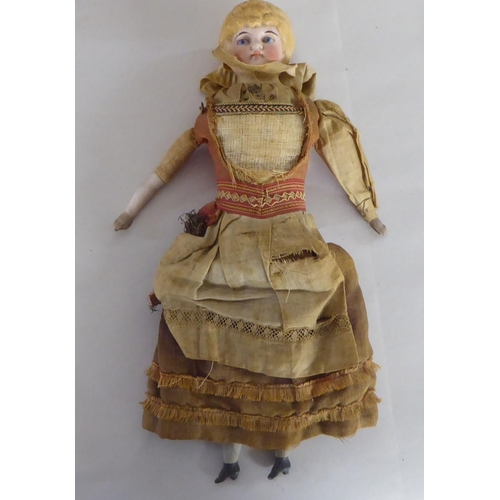 204 - 20thC bisque head porcelain and other dolls  largest 15