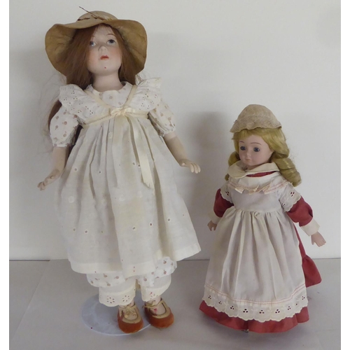 204 - 20thC bisque head porcelain and other dolls  largest 15