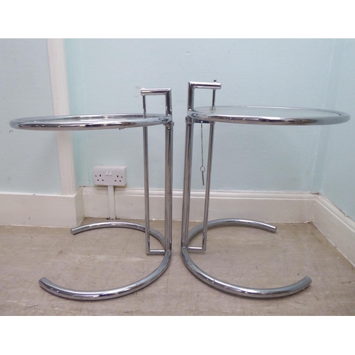 210 - A pair of modern chromium plated, framed and glazed occasional tables  21