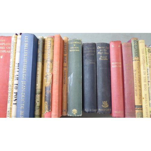 219 - Books, mixed 19th and 20thC reference: to include works by Arthur Ransome and George Macdonald 