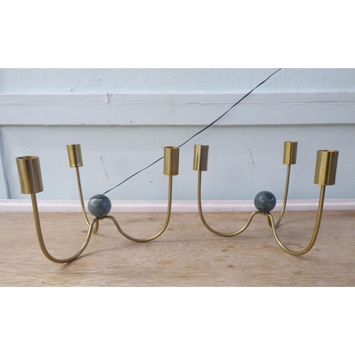 224 - Interior design accessories: to include novelty candle stands, fashioned as pipework by Corpo Sancto... 