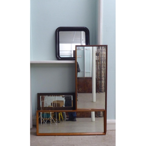 225 - Four 20thC mirrors: to include a 1970s teak framed example  48