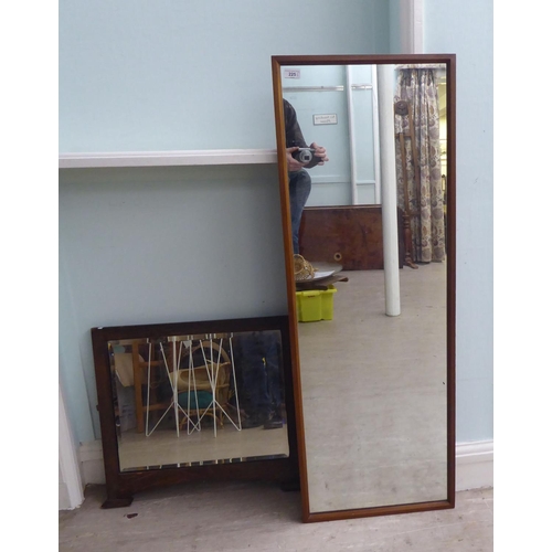 225 - Four 20thC mirrors: to include a 1970s teak framed example  48