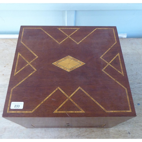 233 - A reproduction of an Edwardian presentation crossbanded string and ebony inlaid mahogany box with st... 