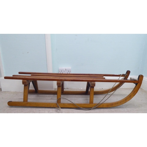 235 - An early/mid 20thC Davos of Germany beech sledge 