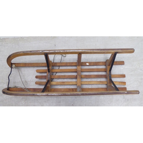 235 - An early/mid 20thC Davos of Germany beech sledge 