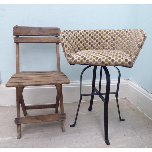 240 - Dolls and child's small furniture: to include a wicker open arm chair 