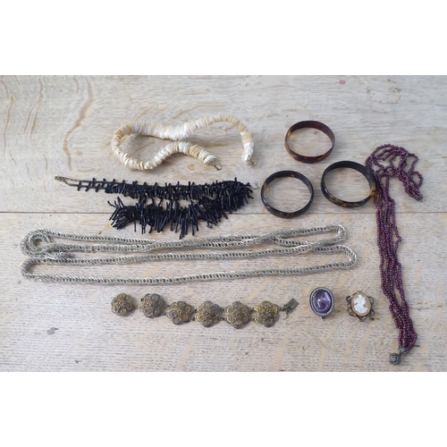 242 - Costume jewellery: to include black coral bangles and necklaces 