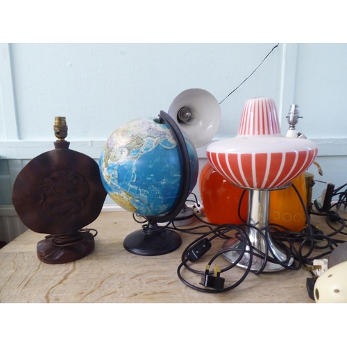 245 - Novelty vintage design table lamps  various forms and designs, some glass shades only 