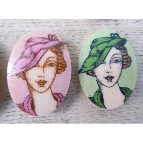 251 - Plastic belt buckles, decorated with portraits of ladies in Deco style