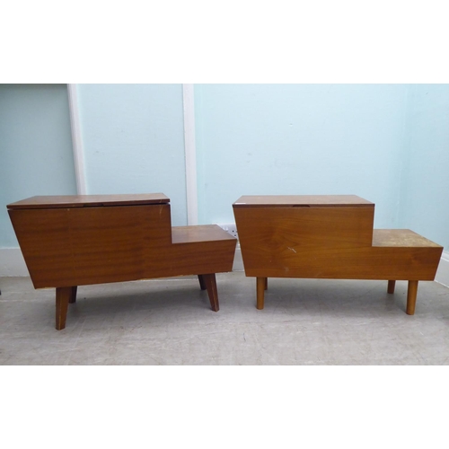 260 - A pair of 1970s teak tables of staggered form with hinged lids and drawer compartments  17