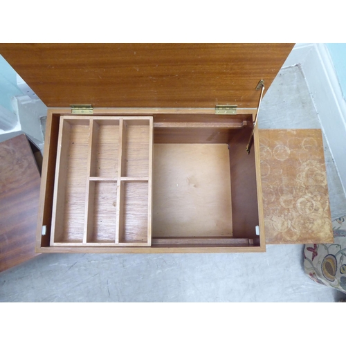 260 - A pair of 1970s teak tables of staggered form with hinged lids and drawer compartments  17