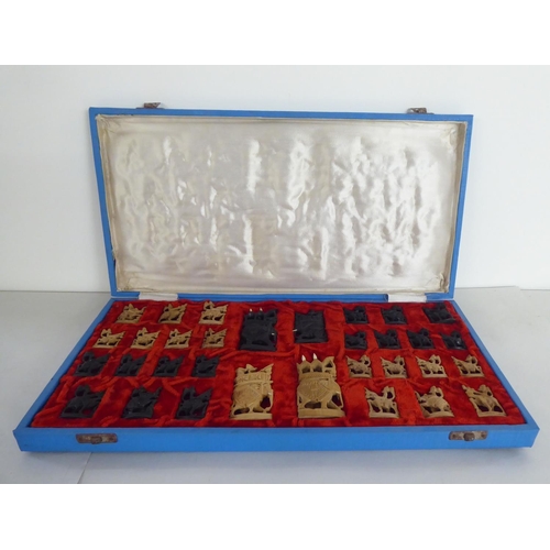 266 - A modern Indian carved softwood complete chess set  cased 