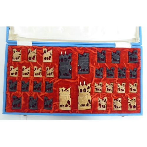 266 - A modern Indian carved softwood complete chess set  cased 