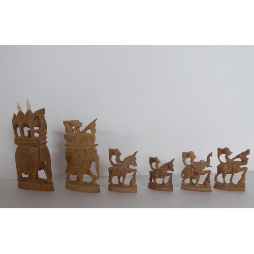 266 - A modern Indian carved softwood complete chess set  cased 