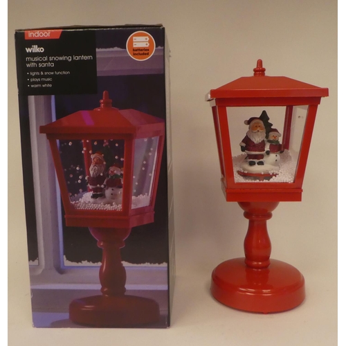 267 - An electric musical snow lantern with Santa  15