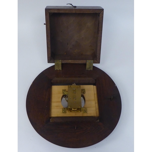 269 - A mid 20thC Newport oak cased timepiece; the movement faced by an Arabic dial  13