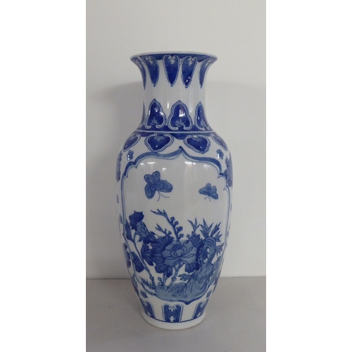 285 - Modern blue and white ceramics: to include a vase  14.5