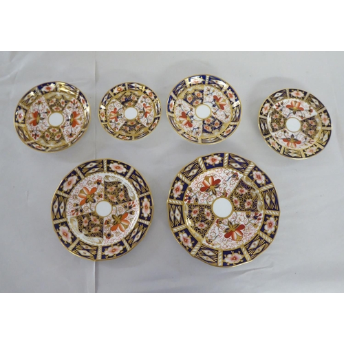 289 - Ceramics: to include graduated Royal Crown Derby china plates, decorated in the Imari palette  ... 