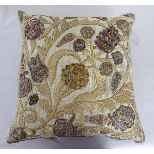 290 - A 20thC foliate patterned embroidered scatter cushion with coloured threads