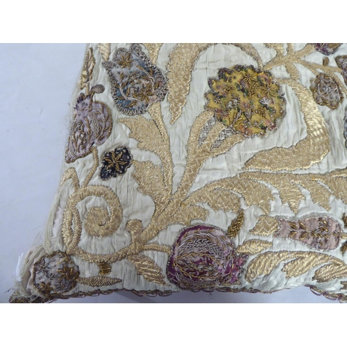 290 - A 20thC foliate patterned embroidered scatter cushion with coloured threads