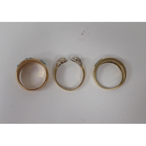 294 - Three 9ct gold rings, one set with a band of multi-coloured stones 