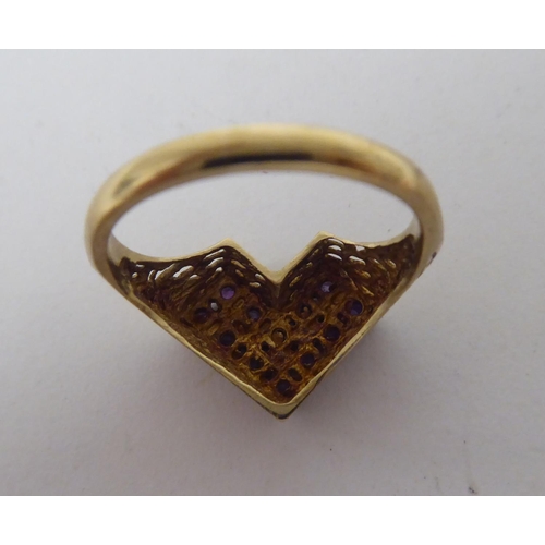 306 - Three 9ct gold rings, one with purple stones, fashioned as a heart