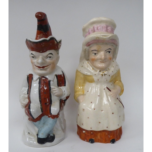 310 - Two late Victorian Staffordshire pottery character jugs 'Punch' and 'Judy'  12