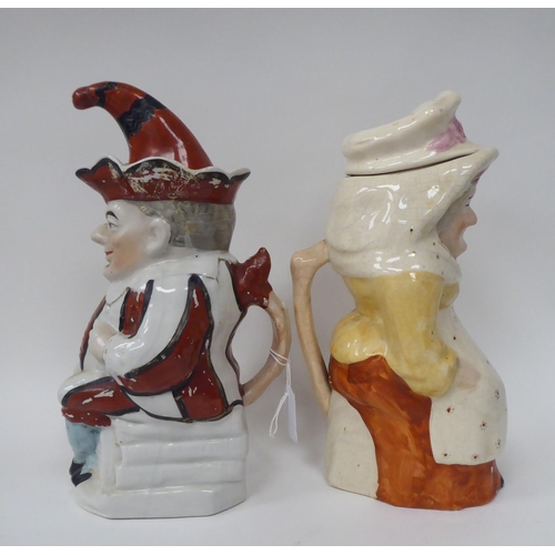 310 - Two late Victorian Staffordshire pottery character jugs 'Punch' and 'Judy'  12