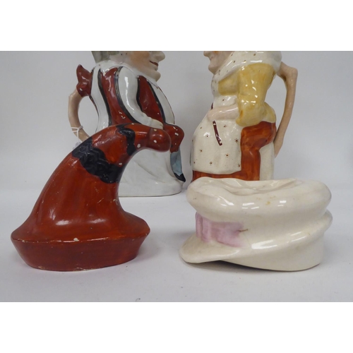 310 - Two late Victorian Staffordshire pottery character jugs 'Punch' and 'Judy'  12