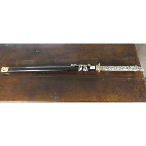 312 - A reproduction Japanese Samurai sword with a composition handle  the blade 29