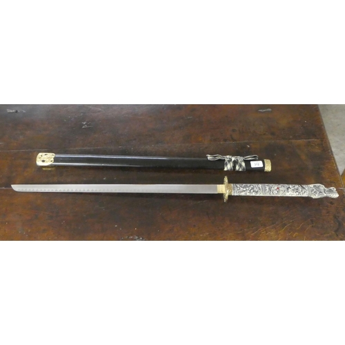 312 - A reproduction Japanese Samurai sword with a composition handle  the blade 29