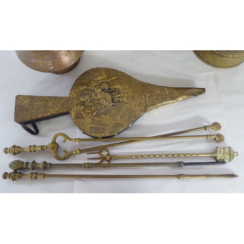 313 - 19th/20thC decorative and functional metalware: to include a Georgian design, peacock feather firesc... 