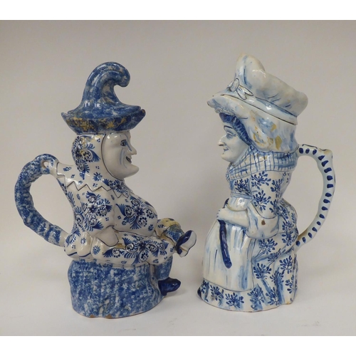 325 - Two mid 19thC Continental tin glazed earthenware character jugs 'Punch' and 'Judy'  12