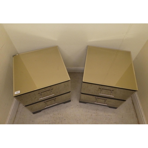 327 - A pair of modern mirrored two drawer bedside cabinets, raised on bracket feet  21