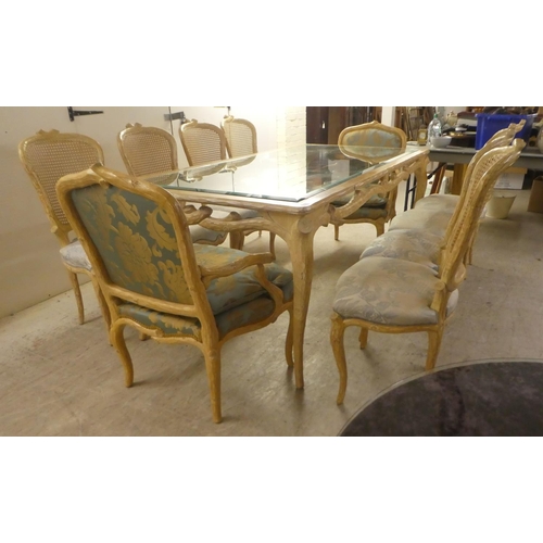 331 - A modern French hunting lodge style, naturally carved, bleached light oak dining table with a glass ... 