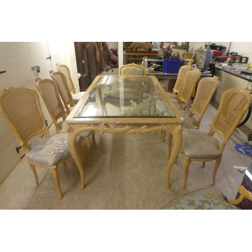 331 - A modern French hunting lodge style, naturally carved, bleached light oak dining table with a glass ... 