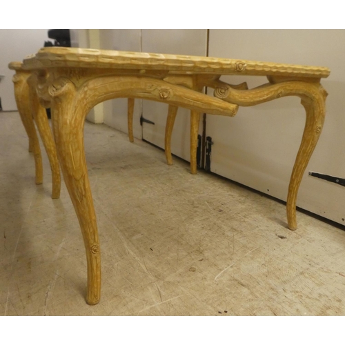 336 - A pair of modern French hunting lodge style, naturally carved, bleached light oak lamp tables with g... 