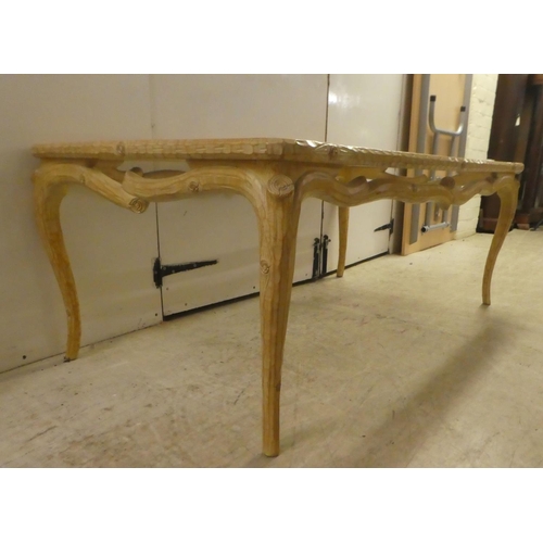 337 - A modern French hunting lodge style, naturally carved, bleached light oak framed coffee table with a... 